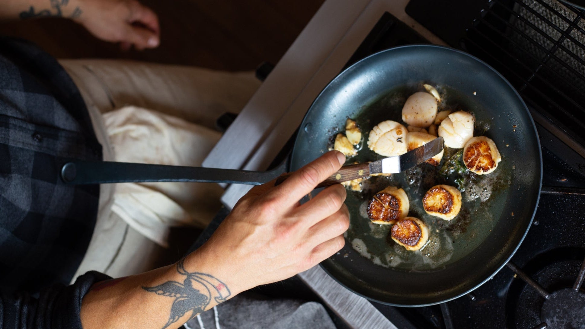 Chef cooking with a 11 inch Pro Skillet from Blanc Creatives