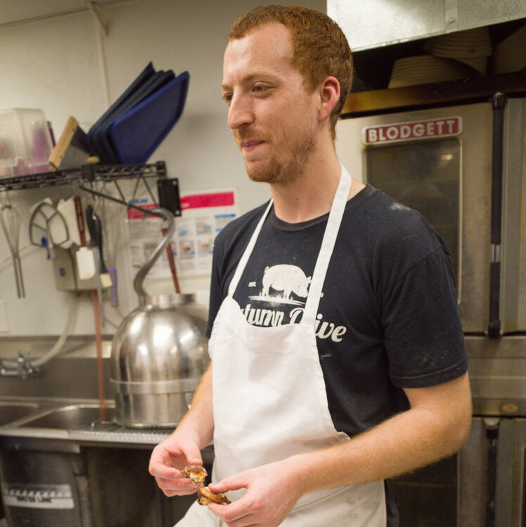 Baker in his bakery kitchen