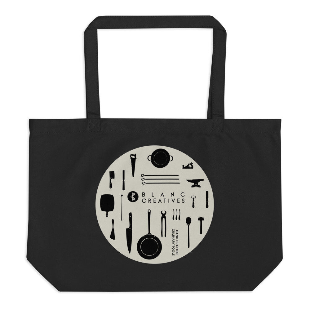 branded tote with images of culinary tools and blacksmithing tools